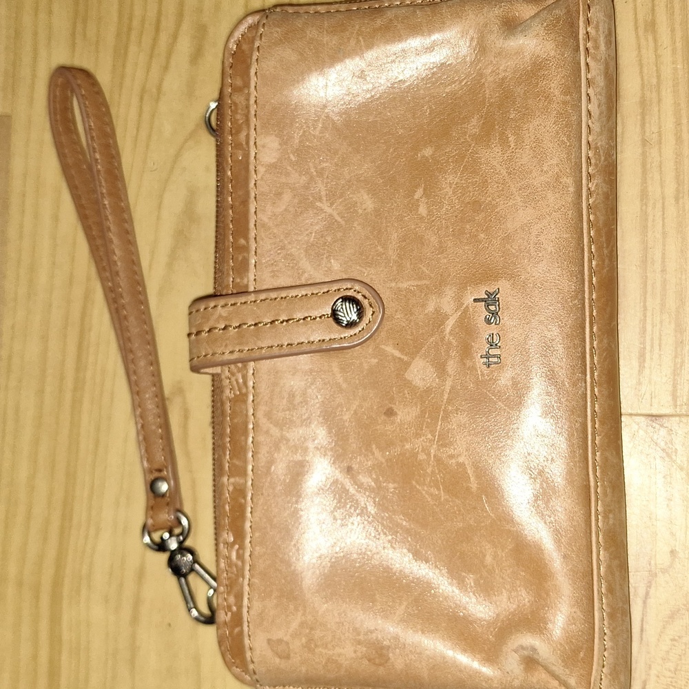 The Sak Iris brown leather wristlet/wallet